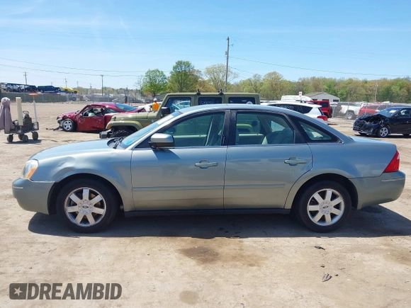 2005 Ford Five Hundred SE z VIN 1FAFP23185G168799, wystawiony jako IAAI lot #42202907 z przebiegiem Nie podano mil oraz . Historia ofert i sprzedaży dostępna na DreamBid. Obrazek 14.