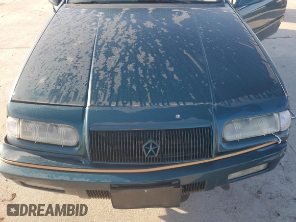 1994 Chrysler LeBaron z VIN 1C3EU4537RF286710, wystawiony jako Copart lot #52610475 z przebiegiem 64 533 mil mil oraz Szkody całkowita. Historia ofert i sprzedaży dostępna na DreamBid. Obrazek 11.