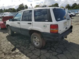 1997 Jeep Grand Cherokee Laredo with VIN 1J4GZ58S8VC647415, listed as a Copart auction lot 49258934 with 0 mi miles and Salvage Title. Bid and sale history available at carsss.com. Image 2.