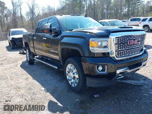 2019 GMC Sierra 2500HD Denali with VIN 1GT12SEY3KF207121, listed as a IAAI auction lot 38782753 with 87,337 mi miles. Bid and sale history available at carsss.com. Image 1.