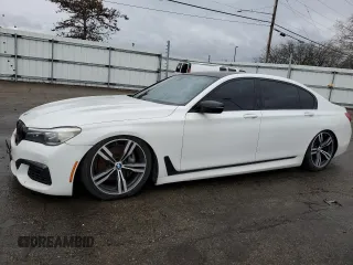2017 BMW 7 Series 740i with VIN WBA7E2C3XHG741242, listed as a Copart auction lot 51577125 with 101,429 mi miles and Clean Title. Bid and sale history available at carsss.com. Image 1.