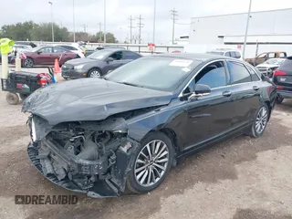 2018 Lincoln MKZ Select z VIN 3LN6L5C93JR620170, wystawiony jako IAAI lot #41488730 z przebiegiem 101 040 mil mil oraz . Historia ofert i sprzedaży dostępna na DreamBid. Obrazek 2.