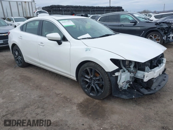 2016 Mazda 6 i Grand Touring with VIN JM1GJ1W54G1485851, listed as a IAAI auction lot 41629410 with 91,327 mi miles. Bid and sale history available at carsss.com. Image 1.