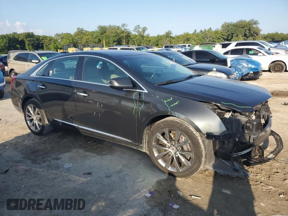 2013 Cadillac XTS Luxury with VIN 2G61P5S32D9235227, listed as a Copart auction lot 61825305 with 59,853 mi miles and Salvage title. Bid and sale history available at DreamBid. Image 4.