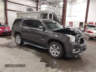2016 GMC Yukon SLT z VIN 1GKS2BKC2GR320923, wystawiony jako IAAI lot #42196868 z przebiegiem 134 754 mil mil oraz . Historia ofert i sprzedaży dostępna na DreamBid. Obrazek 1.