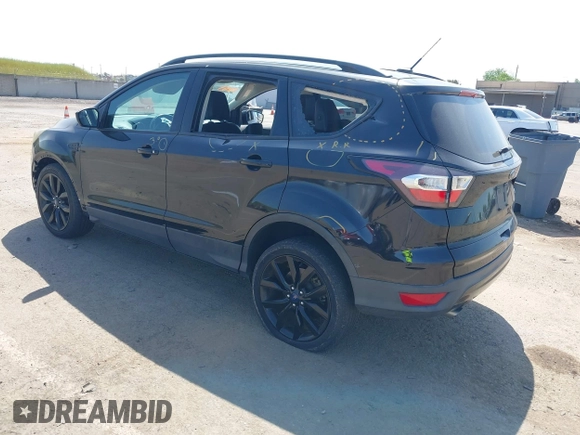 2017 Ford Escape SE with VIN 1FMCU0G9XHUE37185, listed as a IAAI auction lot 42053979 with 72,904 mi miles. Bid and sale history available at carsss.com. Image 3.