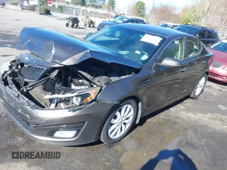 2014 Kia Optima EX z VIN 5XXGN4A78EG320367, wystawiony jako IAAI lot #41858824 z przebiegiem 216 987 mil mil oraz . Historia ofert i sprzedaży dostępna na DreamBid. Obrazek 19.