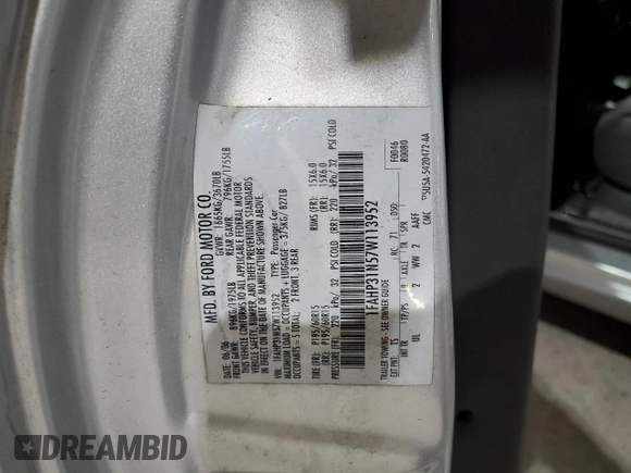 2007 Ford Focus S with VIN 1FAHP31N57W113952, listed as a Copart auction lot 51070245 with 149,809 mi miles and Salvage Title. Bid and sale history available at DreamBid. Image 12.