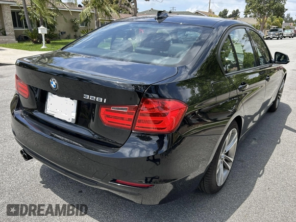 2014 BMW 3 Series 328i with VIN WBA3C1C52EK108680, listed as a IAAI auction lot 42153830 with 73,464 mi miles. Bid and sale history available at carsss.com. Image 4.