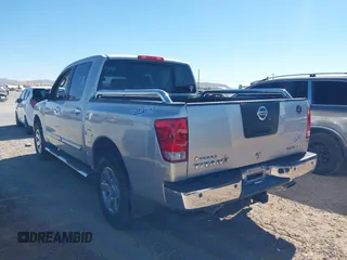 2011 Nissan Titan SV with VIN 1N6BA0ED7BN318878, listed as a IAAI auction lot 41518618 with 169,890 mi miles and . Bid and sale history available at DreamBid. Image 14.