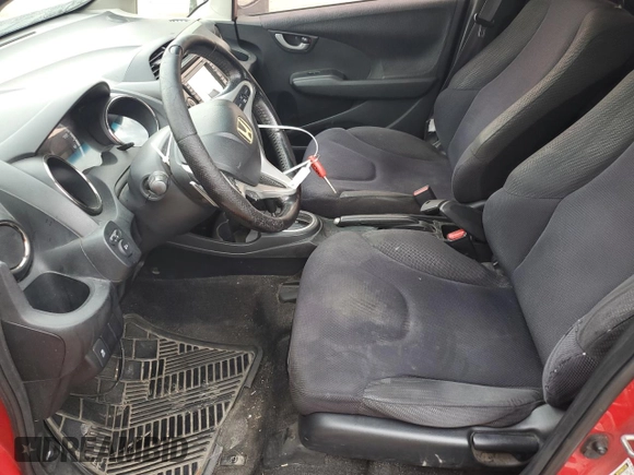 2013 Honda Fit Sport z VIN JHMGE8H62DC003850, wystawiony jako Copart lot #55141065 z przebiegiem 266 938 mil mil oraz Szkoda całkowita • Salvage title. Historia ofert i sprzedaży dostępna na DreamBid. Obrazek 7.