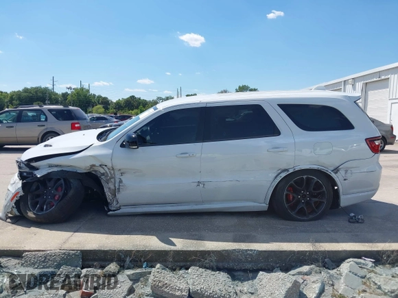 2021 Dodge Durango SRT 392 with VIN 1C4SDJGJ8MC724105, listed as a IAAI auction lot 41883925 with 31,184 mi miles and . Bid and sale history available at DreamBid. Image 14.