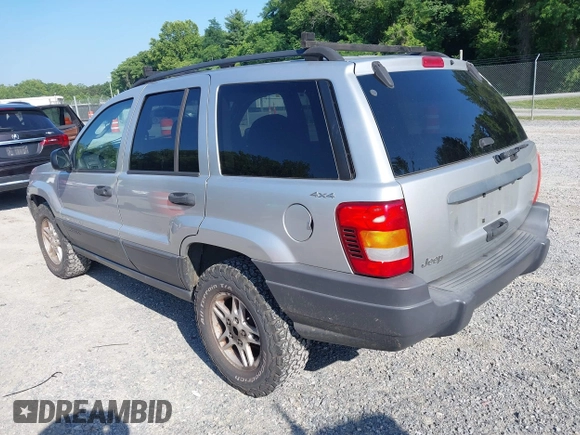 2004 Jeep Grand Cherokee Laredo with VIN 1J4GW48S84C116717, listed as a IAAI auction lot 42568586 with 228,233 mi miles and . Bid and sale history available at DreamBid. Image 3.
