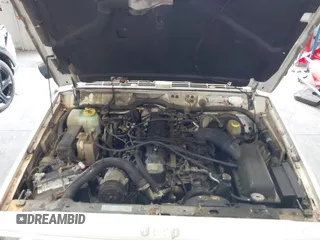 1996 Jeep Cherokee Country z VIN 1J4FT78S0TL280645, wystawiony jako IAAI lot #42340813 z przebiegiem 288 418 mil mil oraz . Historia ofert i sprzedaży dostępna na DreamBid. Obrazek 10.