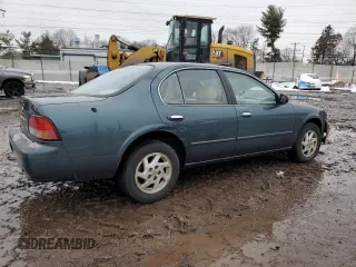 1998 Nissan Maxima GXE with VIN JN1CA21D1WT607137, listed as a Copart auction lot 43629285 with 159,196 mi miles and Salvage title. Bid and sale history available at DreamBid. Image 3.