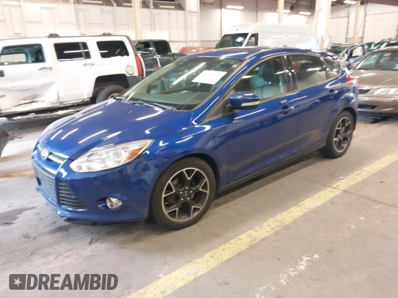 2013 Ford Focus SE with VIN 1FADP3K26DL336078, listed as a IAAI auction lot 41754365 with 104,568 mi miles. Bid and sale history available at carsss.com. Image 2.