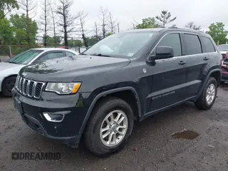 2020 Jeep Grand Cherokee North with VIN 1C4RJFAG5LC371757, listed as a IAAI auction lot 42376118 with 54,508 mi miles and . Bid and sale history available at DreamBid. Image 2.