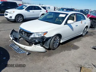2011 Toyota Avalon with VIN 4T1BK3DB6BU371154, listed as a IAAI auction lot 41722144 with 204,575 mi miles and . Bid and sale history available at DreamBid. Image 2.
