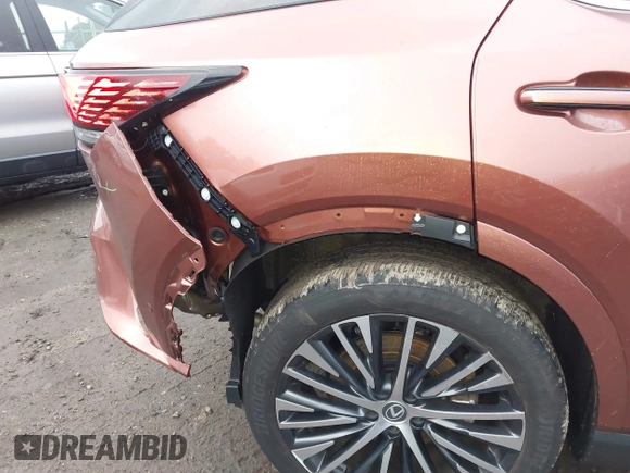 2023 Lexus RX 350h with VIN 2T2BBMCAXPC018936, listed as a IAAI auction lot 41027968 with 20,669 mi miles and . Bid and sale history available at DreamBid. Image 18.