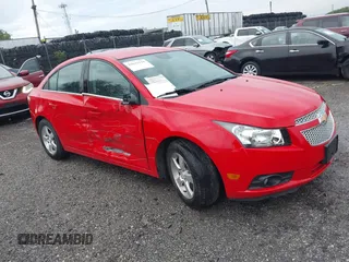 2014 Chevrolet Cruze 1LT with VIN 1G1PC5SB2E7177898, listed as a IAAI auction lot 42643118 with 40,029 mi miles and . Bid and sale history available at DreamBid. Image 1.