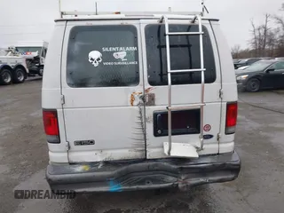 2004 Ford Econoline Cargo with VIN 1FTRE14W44HB53758, listed as a IAAI auction lot 40926124 with 139,104 mi miles. Bid and sale history available at carsss.com. Image 15.