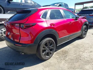2024 Mazda CX-30 2.5 S Select Sport with VIN 3MVDMBBM0RM707223, listed as a IAAI auction lot 41837227 with 8,043 mi miles. Bid and sale history available at carsss.com. Image 4.