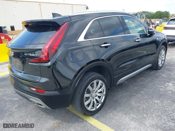 2023 Cadillac XT4 FWD Premium Luxury with VIN 1GYFZCR44PF170452, listed as a IAAI auction lot 42084960 with 22,212 mi miles. Bid and sale history available at carsss.com. Image 4.