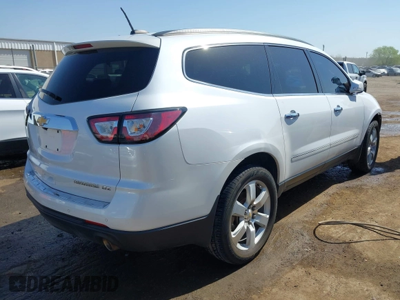 2016 Chevrolet Traverse LTZ z VIN 1GNKRJKDXGJ265413, wystawiony jako IAAI lot #42001292 z przebiegiem 157 129 mil mil oraz . Historia ofert i sprzedaży dostępna na DreamBid. Obrazek 4.