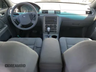 2005 Ford Five Hundred SE z VIN 1FAFP231X5G166052, wystawiony jako Copart lot #57831975 z przebiegiem 90 036 mil mil oraz Tytuł czysty. Historia ofert i sprzedaży dostępna na DreamBid. Obrazek 8.