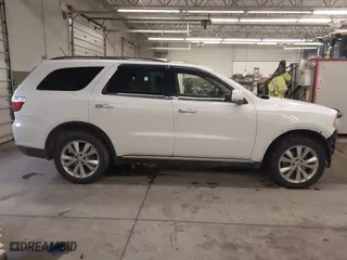 2013 Dodge Durango Crew with VIN 1C4SDJDT1DC540680, listed as a IAAI auction lot 41649262 with 106,016 mi miles. Bid and sale history available at carsss.com. Image 14.