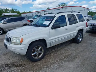 2002 Jeep Grand Cherokee Limited with VIN 1J8GW58J22C115460, listed as a IAAI auction lot 42291615 with 197,132 mi miles and . Bid and sale history available at DreamBid. Image 2.