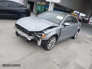 2015 Audi A3 1.8T Premium with VIN WAUACGFF3F1028231, listed as a IAAI auction lot 41586957 with 122,927 mi miles. Bid and sale history available at carsss.com. Image 2.