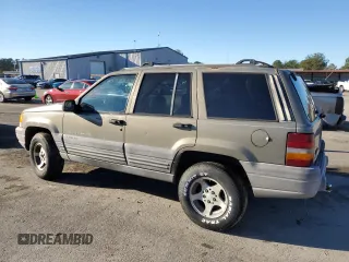 1997 Jeep Grand Cherokee TSi with VIN 1J4FX58S4VC516340, listed as a Copart auction lot 84409044 with 256,300 mi miles and Clean Title. Bid and sale history available at carsss.com. Image 2.