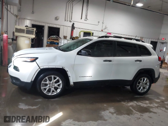 2016 Jeep Cherokee Sport z VIN 1C4PJLAB2GW291282, wystawiony jako IAAI lot #41579554 z przebiegiem 121 590 mil mil oraz . Historia ofert i sprzedaży dostępna na DreamBid. Obrazek 14.
