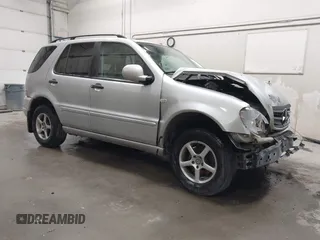 2000 Mercedes-Benz M with VIN 4JGAB54E4YA199556, listed as a IAAI auction lot 42111380 with 155,061 mi miles. Bid and sale history available at carsss.com. Image 1.
