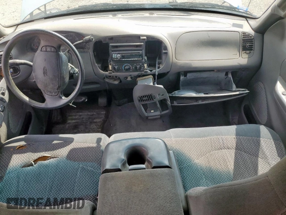 1999 Ford F-150 with VIN 1FTRX07W0XKB88434, listed as a Copart auction lot 60063135 with 277,188 mi miles and Salvage title. Bid and sale history available at DreamBid. Image 8.