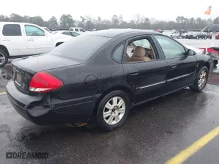 2004 Ford Taurus SEL with VIN 1FAFP56S94A143482, listed as a IAAI auction lot 41418002 with 99,645 mi miles. Bid and sale history available at carsss.com. Image 4.
