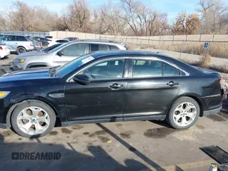 2012 Ford Taurus SEL z VIN 1FAHP2EW3CG128208, wystawiony jako IAAI lot #41020348 z przebiegiem 161 794 mil mil oraz . Historia ofert i sprzedaży dostępna na DreamBid. Obrazek 14.