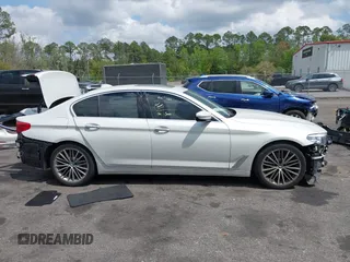 2018 BMW 5 Series 530i with VIN WBAJA5C55JWA38747, listed as a IAAI auction lot 41922937 with 100,951 mi miles and . Bid and sale history available at DreamBid. Image 13.