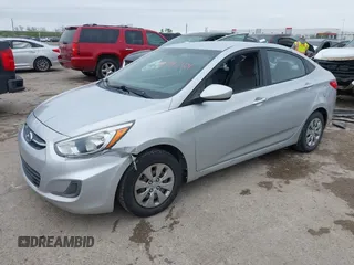 2015 Hyundai Accent GLS with VIN KMHCT4AE5FU883113, listed as a IAAI auction lot 41899701 with 123,023 mi miles and . Bid and sale history available at carsss.com. Image 2.