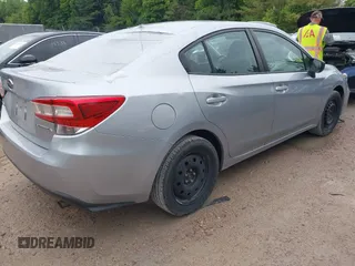 2019 Subaru Impreza with VIN 4S3GKAB60K3608733, listed as a IAAI auction lot 42361729 with 58,863 mi miles and . Bid and sale history available at DreamBid. Image 4.