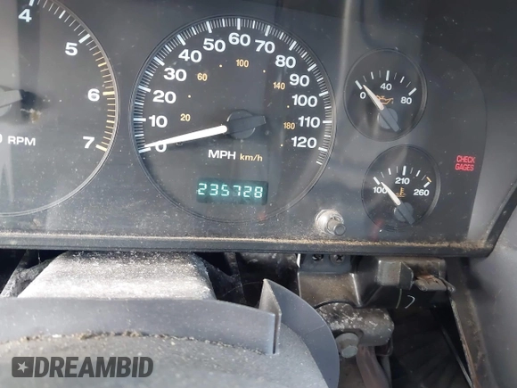 1999 Jeep Grand Cherokee Limited with VIN 1J4GW68NXXC637464, listed as a IAAI auction lot 41561690 with 235,728 mi miles. Bid and sale history available at carsss.com. Image 7.