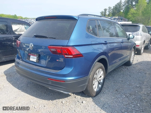 2018 Volkswagen Tiguan S with VIN 3VV0B7AXXJM018455, listed as a IAAI auction lot 41979115 with 92,104 mi miles. Bid and sale history available at carsss.com. Image 4.