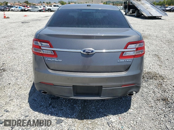 2013 Ford Taurus Limited z VIN 1FAHP2F83DG126069, wystawiony jako Copart lot #56520615 z przebiegiem 234 454 mil mil oraz Szkoda całkowita • Salvage title. Historia ofert i sprzedaży dostępna na DreamBid. Obrazek 6.