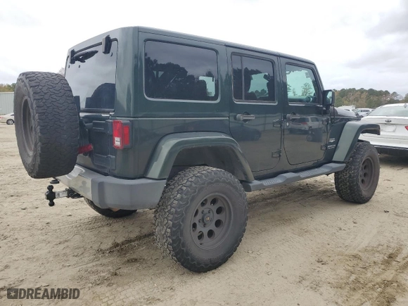 2011 Jeep Wrangler Unlimited Sahara with VIN 1J4BA5H16BL557068, listed as a Copart auction lot 80429454 with 142,428 mi miles and Salvage Title. Bid and sale history available at carsss.com. Image 3.
