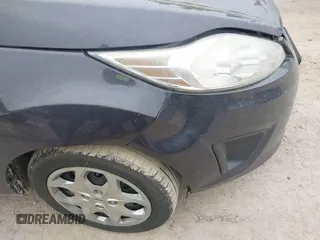 2013 Ford Fiesta S z VIN 3FADP4AJ9DM175576, wystawiony jako IAAI lot #42449969 z przebiegiem 123 959 mil mil oraz . Historia ofert i sprzedaży dostępna na DreamBid. Obrazek 14.