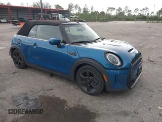 2022 MINI Convertible Cooper S z VIN WMW43DL06N3P19784, wystawiony jako IAAI lot #42635816 z przebiegiem 17 053 mil mil oraz . Historia ofert i sprzedaży dostępna na DreamBid. Obrazek 1.