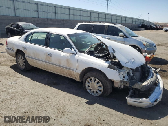 2001 Lincoln Continental z VIN 1LNHM97V31Y673523, wystawiony jako Copart lot #52451385 z przebiegiem 133 879 mil mil oraz Szkoda całkowita • Salvage title. Historia ofert i sprzedaży dostępna na DreamBid. Obrazek 4.