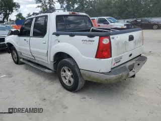 2003 Ford Explorer Sport Trac XLS with VIN 1FMZU67E43UB37127, listed as a Copart auction lot 58377075 with 219,033 mi miles and Salvage title. Bid and sale history available at DreamBid. Image 2.