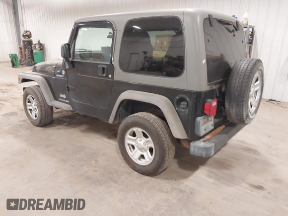 2006 Jeep Wrangler Sport Right Hand Drive with VIN 1J4F449S56P741328, listed as a IAAI auction lot 41476847 with 67,203 mi miles. Bid and sale history available at carsss.com. Image 3.